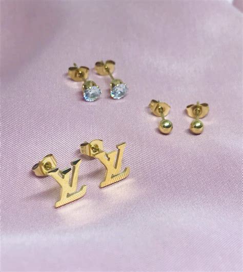 louis vuitton aretes|louis vuitton t shirts.